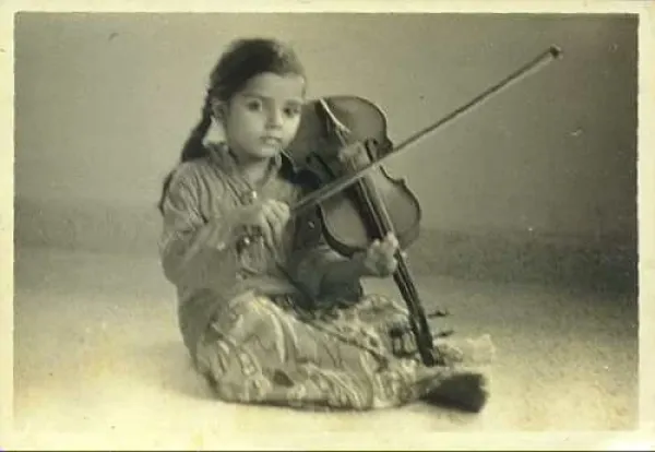 Learning violin at the age of four